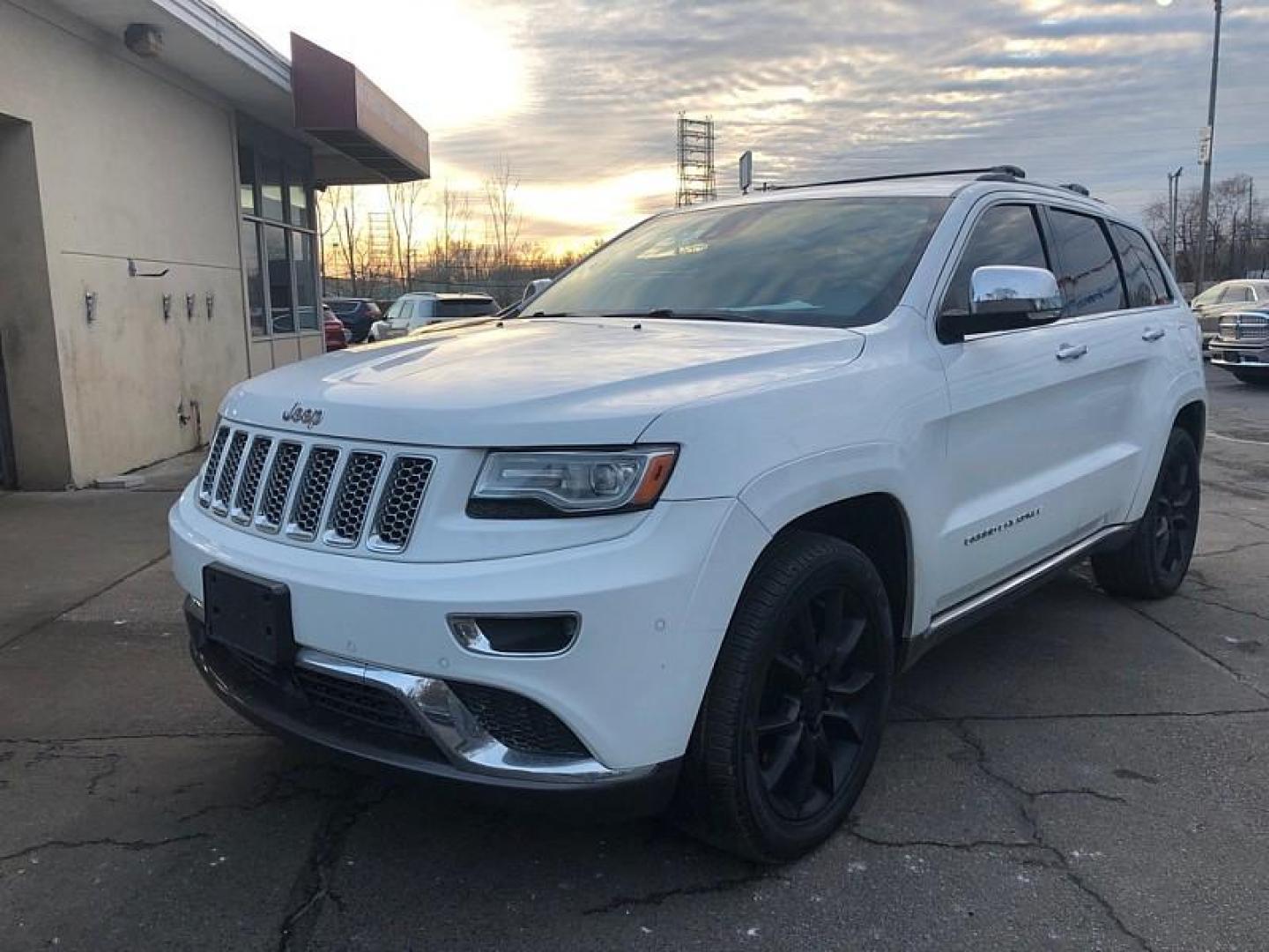 2014 WHITE /BLACK Jeep Grand Cherokee Summit 4WD (1C4RJFJT2EC) with an 5.7L V8 OHV 16V engine, 5-Speed Automatic transmission, located at 3304 Woodville Road, Northwood, OH, 43619, (419) 210-8019, 41.612694, -83.480743 - Your #1 Destination for Auto Loans and mdash;No Matter Your Credit!At our dealership, we believe everyone deserves the opportunity to drive their dream car and mdash;whether you have good credit, bad credit, or no credit at all. With a wide selection of hundreds of cars, trucks, and SUVs, you'll fin - Photo#0