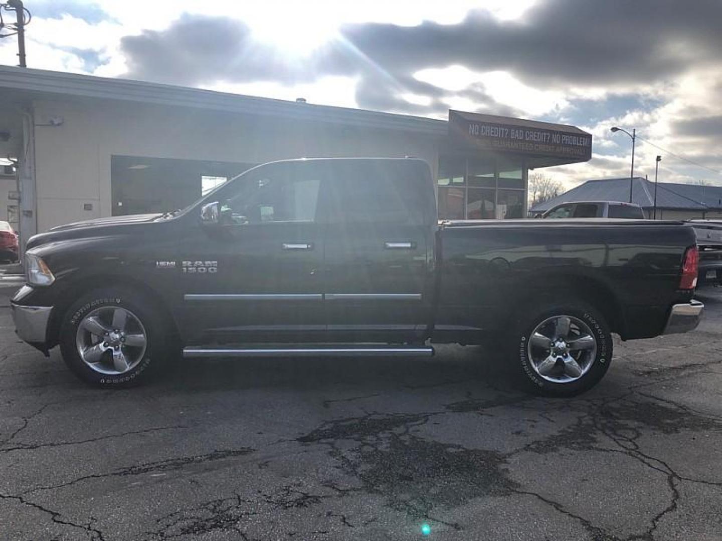 2016 BLACK /GREY RAM 1500 SLT Quad Cab 4WD (1C6RR7GT8GS) with an 5.7L V8 OHV 16V engine, 6A transmission, located at 3304 Woodville Road, Northwood, OH, 43619, (419) 210-8019, 41.612694, -83.480743 - Your #1 Destination for Auto Loans and mdash;No Matter Your Credit!At our dealership, we believe everyone deserves the opportunity to drive their dream car and mdash;whether you have good credit, bad credit, or no credit at all. With a wide selection of hundreds of cars, trucks, and SUVs, you'll fin - Photo#1