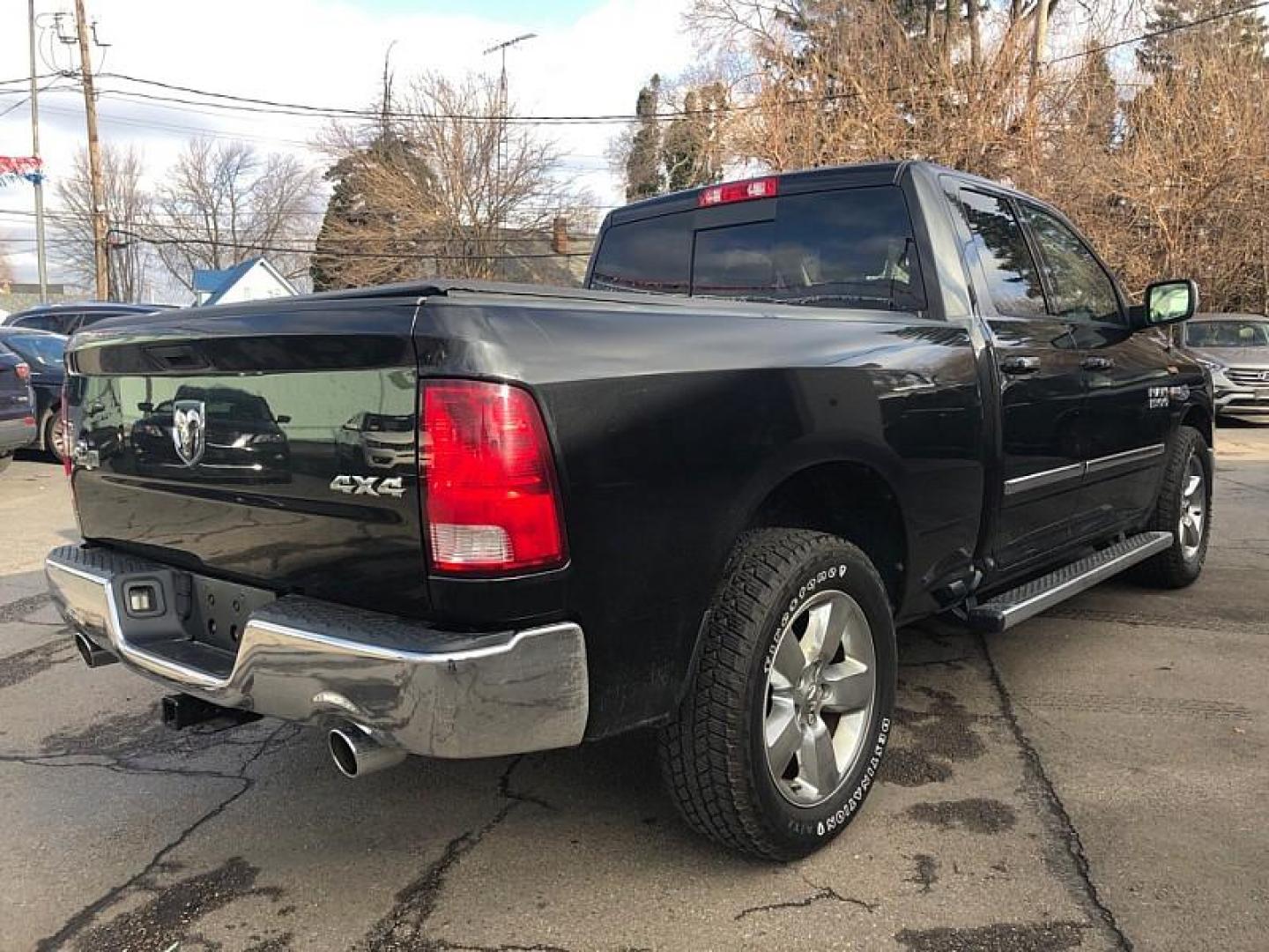 2016 BLACK /GREY RAM 1500 SLT Quad Cab 4WD (1C6RR7GT8GS) with an 5.7L V8 OHV 16V engine, 6A transmission, located at 3304 Woodville Road, Northwood, OH, 43619, (419) 210-8019, 41.612694, -83.480743 - Your #1 Destination for Auto Loans and mdash;No Matter Your Credit!At our dealership, we believe everyone deserves the opportunity to drive their dream car and mdash;whether you have good credit, bad credit, or no credit at all. With a wide selection of hundreds of cars, trucks, and SUVs, you'll fin - Photo#4