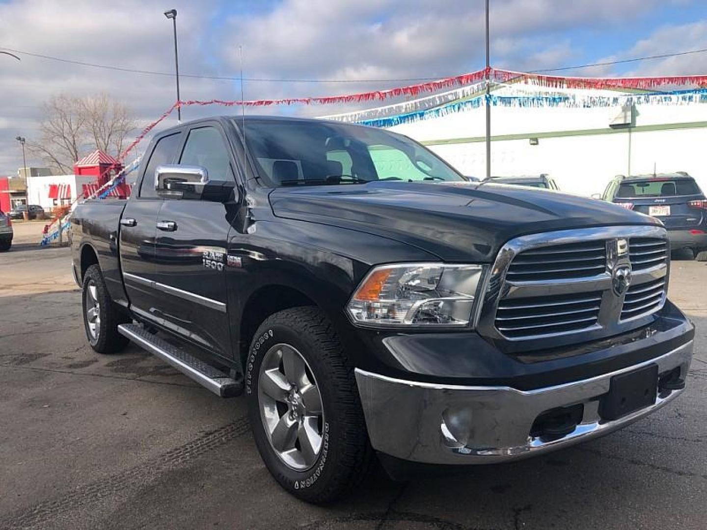 2016 BLACK /GREY RAM 1500 SLT Quad Cab 4WD (1C6RR7GT8GS) with an 5.7L V8 OHV 16V engine, 6A transmission, located at 3304 Woodville Road, Northwood, OH, 43619, (419) 210-8019, 41.612694, -83.480743 - Your #1 Destination for Auto Loans and mdash;No Matter Your Credit!At our dealership, we believe everyone deserves the opportunity to drive their dream car and mdash;whether you have good credit, bad credit, or no credit at all. With a wide selection of hundreds of cars, trucks, and SUVs, you'll fin - Photo#6