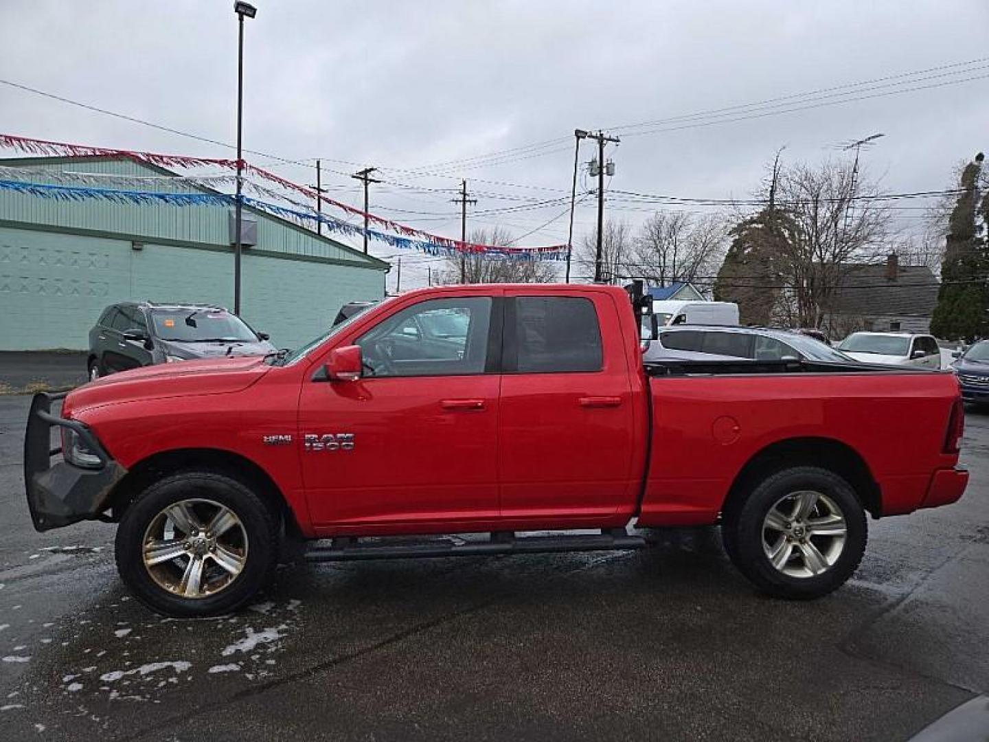 2015 RED /BLACK RAM 1500 Sport Quad Cab 4WD (1C6RR7HT0FS) with an 5.7L V8 OHV 16V engine, 6-Speed Automatic transmission, located at 3304 Woodville Road, Northwood, OH, 43619, (419) 210-8019, 41.612694, -83.480743 - Your #1 Destination for Auto Loans and mdash;No Matter Your Credit!At our dealership, we believe everyone deserves the opportunity to drive their dream car and mdash;whether you have good credit, bad credit, or no credit at all. With a wide selection of hundreds of cars, trucks, and SUVs, you'll fin - Photo#1