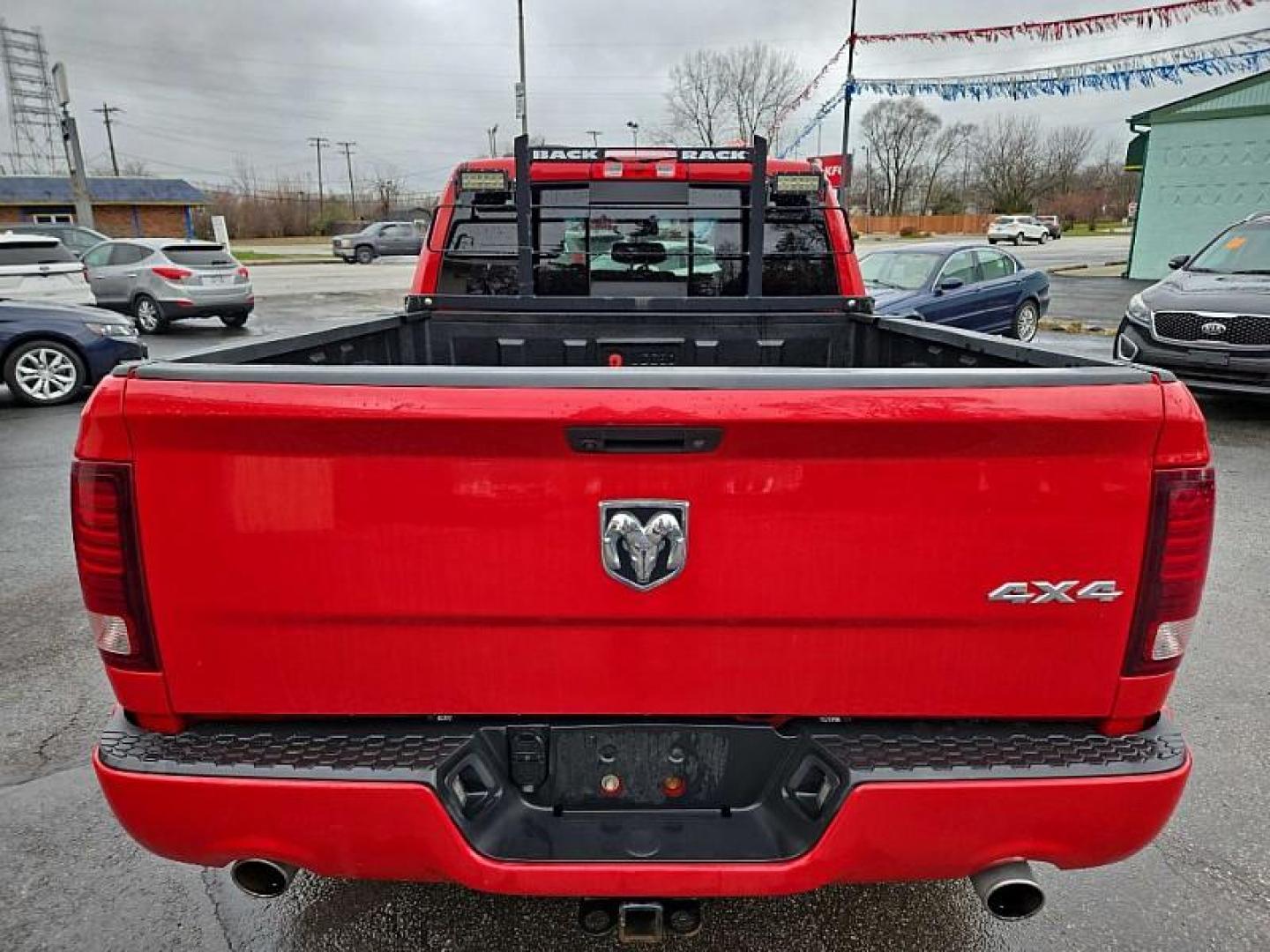 2015 RED /BLACK RAM 1500 Sport Quad Cab 4WD (1C6RR7HT0FS) with an 5.7L V8 OHV 16V engine, 6-Speed Automatic transmission, located at 3304 Woodville Road, Northwood, OH, 43619, (419) 210-8019, 41.612694, -83.480743 - Your #1 Destination for Auto Loans and mdash;No Matter Your Credit!At our dealership, we believe everyone deserves the opportunity to drive their dream car and mdash;whether you have good credit, bad credit, or no credit at all. With a wide selection of hundreds of cars, trucks, and SUVs, you'll fin - Photo#3