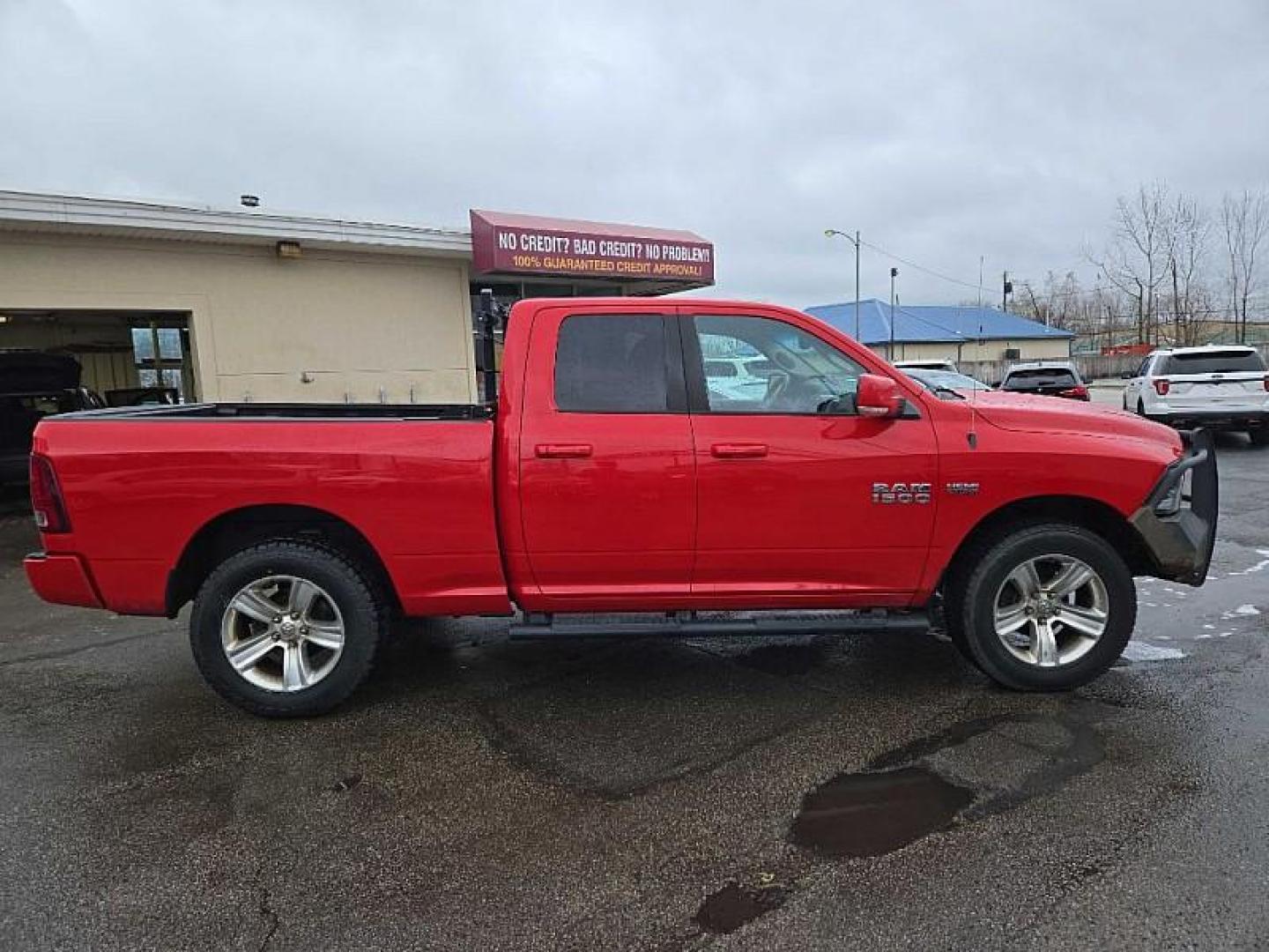 2015 RED /BLACK RAM 1500 Sport Quad Cab 4WD (1C6RR7HT0FS) with an 5.7L V8 OHV 16V engine, 6-Speed Automatic transmission, located at 3304 Woodville Road, Northwood, OH, 43619, (419) 210-8019, 41.612694, -83.480743 - Your #1 Destination for Auto Loans and mdash;No Matter Your Credit!At our dealership, we believe everyone deserves the opportunity to drive their dream car and mdash;whether you have good credit, bad credit, or no credit at all. With a wide selection of hundreds of cars, trucks, and SUVs, you'll fin - Photo#5