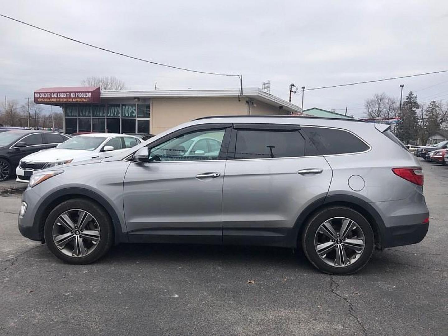 2014 SILVER /TAN Hyundai Santa Fe Limited AWD (KM8SRDHF2EU) with an 3.3L V6 DOHC 24V engine, 6-Speed Automatic transmission, located at 3304 Woodville Road, Northwood, OH, 43619, (419) 210-8019, 41.612694, -83.480743 - Photo#1