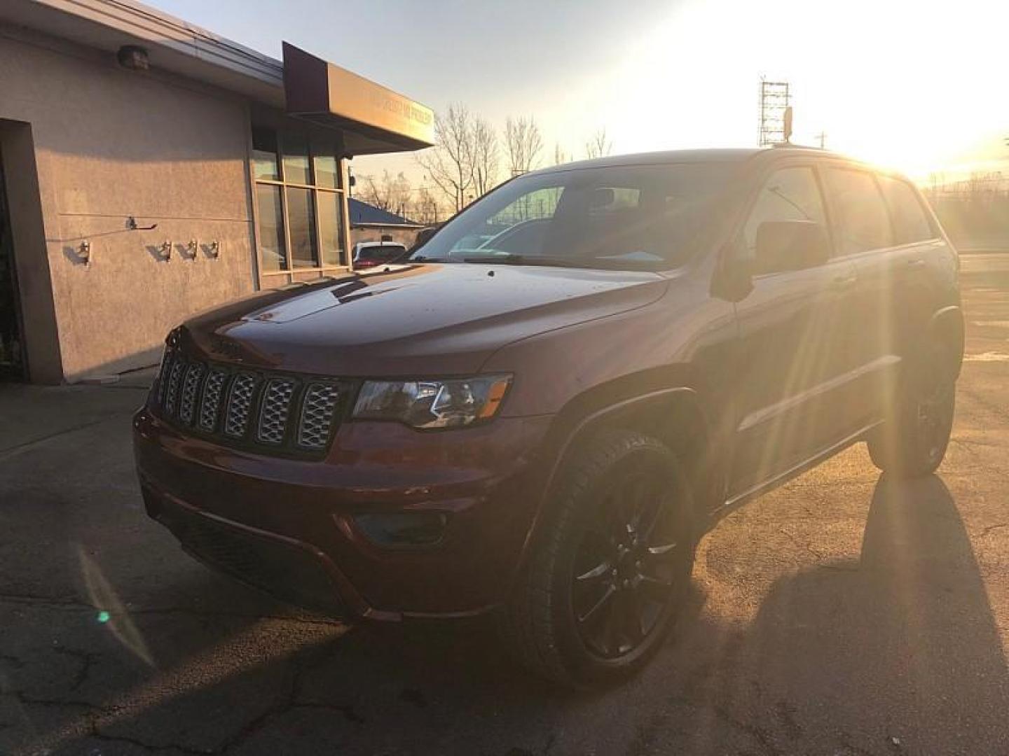 2017 RED /BLACK Jeep Grand Cherokee Laredo 4WD (1C4RJFAG7HC) with an 3.6L V6 DOHC 24V engine, 8A transmission, located at 3304 Woodville Road, Northwood, OH, 43619, (419) 210-8019, 41.612694, -83.480743 - Your #1 Destination for Auto Loans and mdash;No Matter Your Credit!At our dealership, we believe everyone deserves the opportunity to drive their dream car and mdash;whether you have good credit, bad credit, or no credit at all. With a wide selection of hundreds of cars, trucks, and SUVs, you'll fin - Photo#0