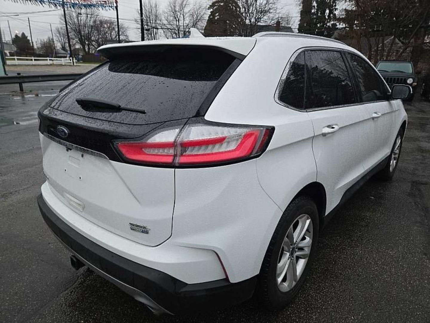 2019 WHITE /BLACK Ford Edge SEL AWD (2FMPK4J90KB) with an 2.0L L4 DOHC 16V engine, 6A transmission, located at 3304 Woodville Road, Northwood, OH, 43619, (419) 210-8019, 41.612694, -83.480743 - Your #1 Destination for Auto Loans and mdash;No Matter Your Credit!At our dealership, we believe everyone deserves the opportunity to drive their dream car and mdash;whether you have good credit, bad credit, or no credit at all. With a wide selection of hundreds of cars, trucks, and SUVs, you'll fin - Photo#2