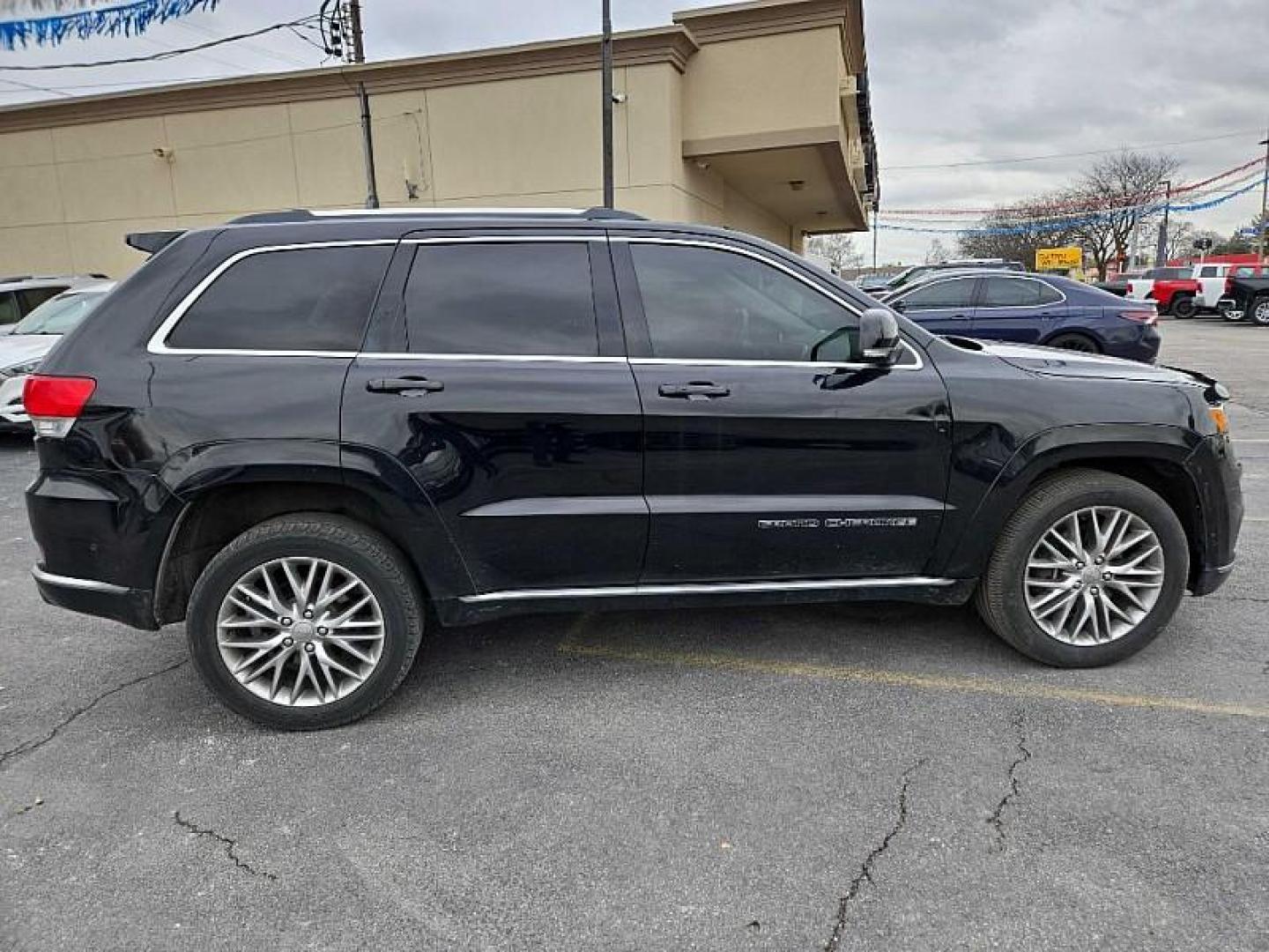 2017 BLACK /BLACK Jeep Grand Cherokee Summit 4WD (1C4RJFJT4HC) with an 5.7L V8 OHV 16V engine, 8A transmission, located at 3304 Woodville Road, Northwood, OH, 43619, (419) 210-8019, 41.612694, -83.480743 - Your #1 Destination for Auto Loans and mdash;No Matter Your Credit!At our dealership, we believe everyone deserves the opportunity to drive their dream car and mdash;whether you have good credit, bad credit, or no credit at all. With a wide selection of hundreds of cars, trucks, and SUVs, you'll fin - Photo#4