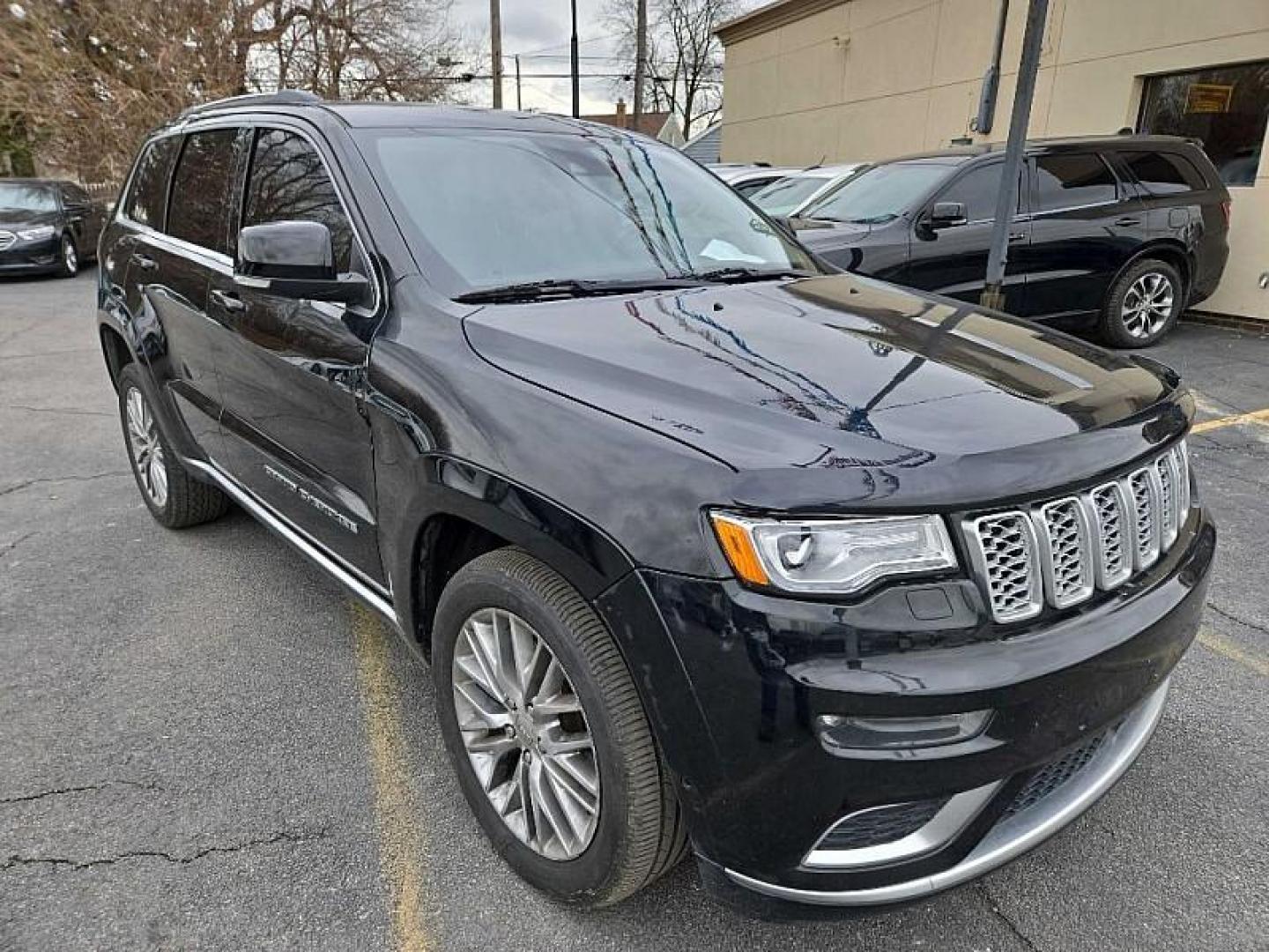 2017 BLACK /BLACK Jeep Grand Cherokee Summit 4WD (1C4RJFJT4HC) with an 5.7L V8 OHV 16V engine, 8A transmission, located at 3304 Woodville Road, Northwood, OH, 43619, (419) 210-8019, 41.612694, -83.480743 - Your #1 Destination for Auto Loans and mdash;No Matter Your Credit!At our dealership, we believe everyone deserves the opportunity to drive their dream car and mdash;whether you have good credit, bad credit, or no credit at all. With a wide selection of hundreds of cars, trucks, and SUVs, you'll fin - Photo#6