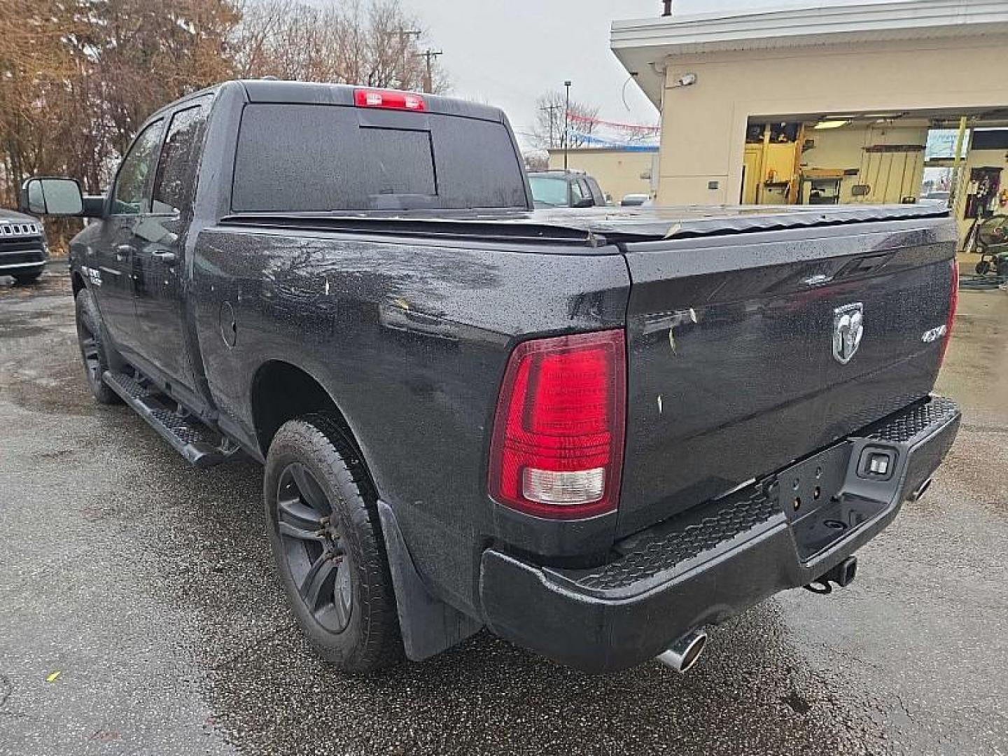 2015 BLACK /BLACK RAM 1500 Sport Quad Cab 4WD (1C6RR7HTXFS) with an 5.7L V8 OHV 16V engine, 6-Speed Automatic transmission, located at 3304 Woodville Road, Northwood, OH, 43619, (419) 210-8019, 41.612694, -83.480743 - Your #1 Destination for Auto Loans and mdash;No Matter Your Credit!At our dealership, we believe everyone deserves the opportunity to drive their dream car and mdash;whether you have good credit, bad credit, or no credit at all. With a wide selection of hundreds of cars, trucks, and SUVs, you'll fin - Photo#2