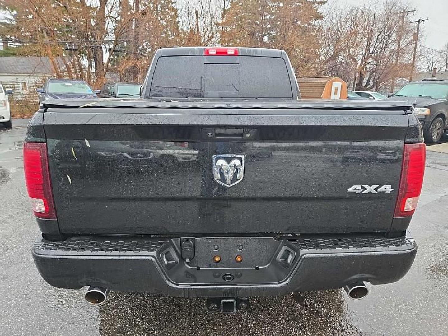 2015 BLACK /BLACK RAM 1500 Sport Quad Cab 4WD (1C6RR7HTXFS) with an 5.7L V8 OHV 16V engine, 6-Speed Automatic transmission, located at 3304 Woodville Road, Northwood, OH, 43619, (419) 210-8019, 41.612694, -83.480743 - Your #1 Destination for Auto Loans and mdash;No Matter Your Credit!At our dealership, we believe everyone deserves the opportunity to drive their dream car and mdash;whether you have good credit, bad credit, or no credit at all. With a wide selection of hundreds of cars, trucks, and SUVs, you'll fin - Photo#3