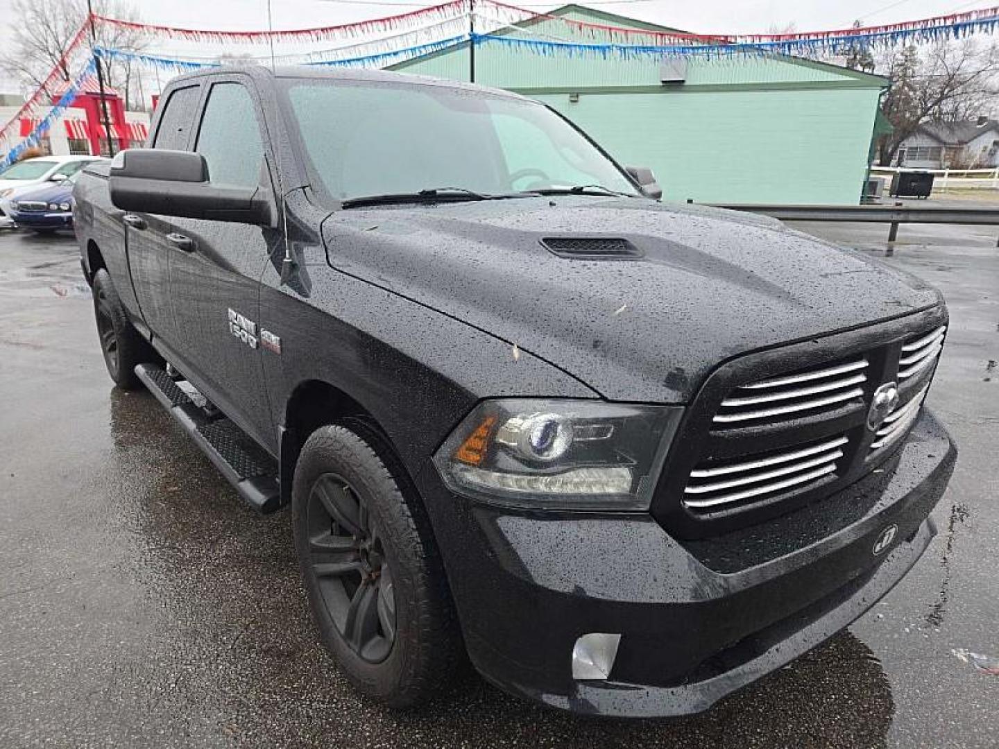 2015 BLACK /BLACK RAM 1500 Sport Quad Cab 4WD (1C6RR7HTXFS) with an 5.7L V8 OHV 16V engine, 6-Speed Automatic transmission, located at 3304 Woodville Road, Northwood, OH, 43619, (419) 210-8019, 41.612694, -83.480743 - Your #1 Destination for Auto Loans and mdash;No Matter Your Credit!At our dealership, we believe everyone deserves the opportunity to drive their dream car and mdash;whether you have good credit, bad credit, or no credit at all. With a wide selection of hundreds of cars, trucks, and SUVs, you'll fin - Photo#6