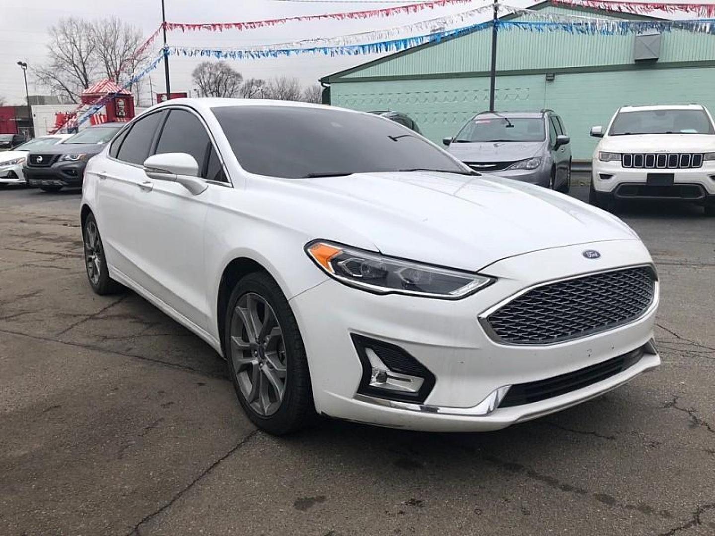 2020 WHITE /BLACK Ford Fusion Hybrid Titanium (3FA6P0RU9LR) with an 2.0L L4 DOHC 16V HYBRID engine, CVT transmission, located at 3304 Woodville Road, Northwood, OH, 43619, (419) 210-8019, 41.612694, -83.480743 - Your #1 Destination for Auto Loans and mdash;No Matter Your Credit!At our dealership, we believe everyone deserves the opportunity to drive their dream car and mdash;whether you have good credit, bad credit, or no credit at all. With a wide selection of hundreds of cars, trucks, and SUVs, you'll fin - Photo#6