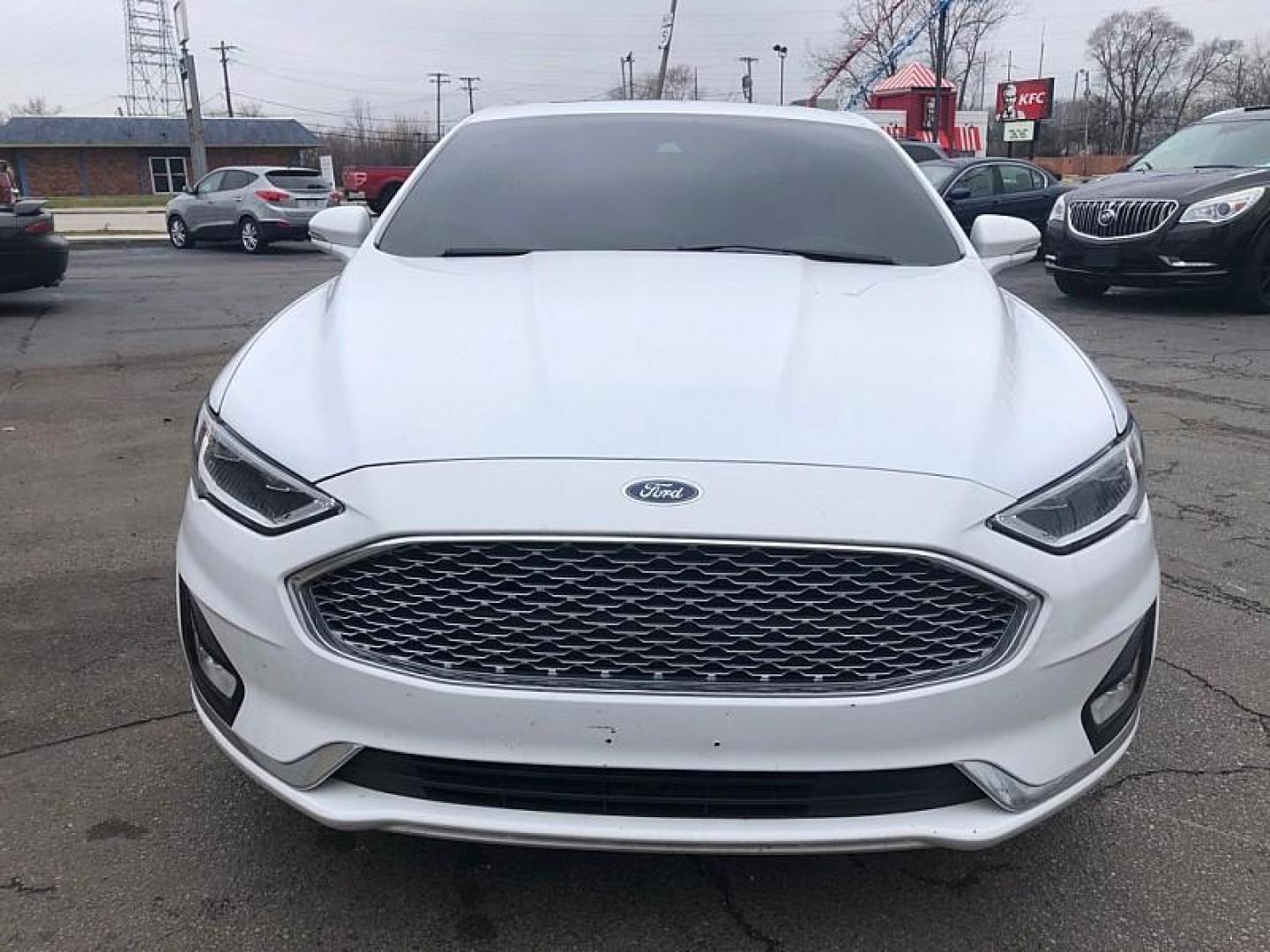 2020 WHITE /BLACK Ford Fusion Hybrid Titanium (3FA6P0RU9LR) with an 2.0L L4 DOHC 16V HYBRID engine, CVT transmission, located at 3304 Woodville Road, Northwood, OH, 43619, (419) 210-8019, 41.612694, -83.480743 - Your #1 Destination for Auto Loans and mdash;No Matter Your Credit!At our dealership, we believe everyone deserves the opportunity to drive their dream car and mdash;whether you have good credit, bad credit, or no credit at all. With a wide selection of hundreds of cars, trucks, and SUVs, you'll fin - Photo#7