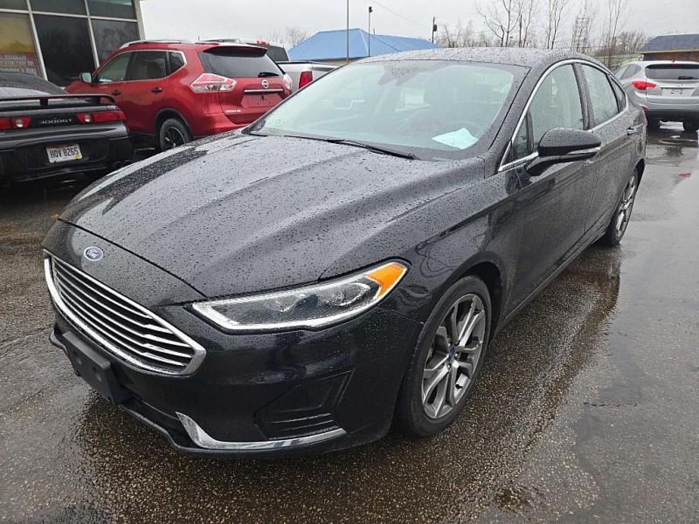 2019 BLACK /BLACK Ford Fusion SEL (3FA6P0CD3KR) with an 1.5L L4 DOHC 16V engine, 6A transmission, located at 3304 Woodville Road, Northwood, OH, 43619, (419) 210-8019, 41.612694, -83.480743 - Your #1 Destination for Auto Loans and mdash;No Matter Your Credit!At our dealership, we believe everyone deserves the opportunity to drive their dream car and mdash;whether you have good credit, bad credit, or no credit at all. With a wide selection of hundreds of cars, trucks, and SUVs, you'll fin - Photo#0