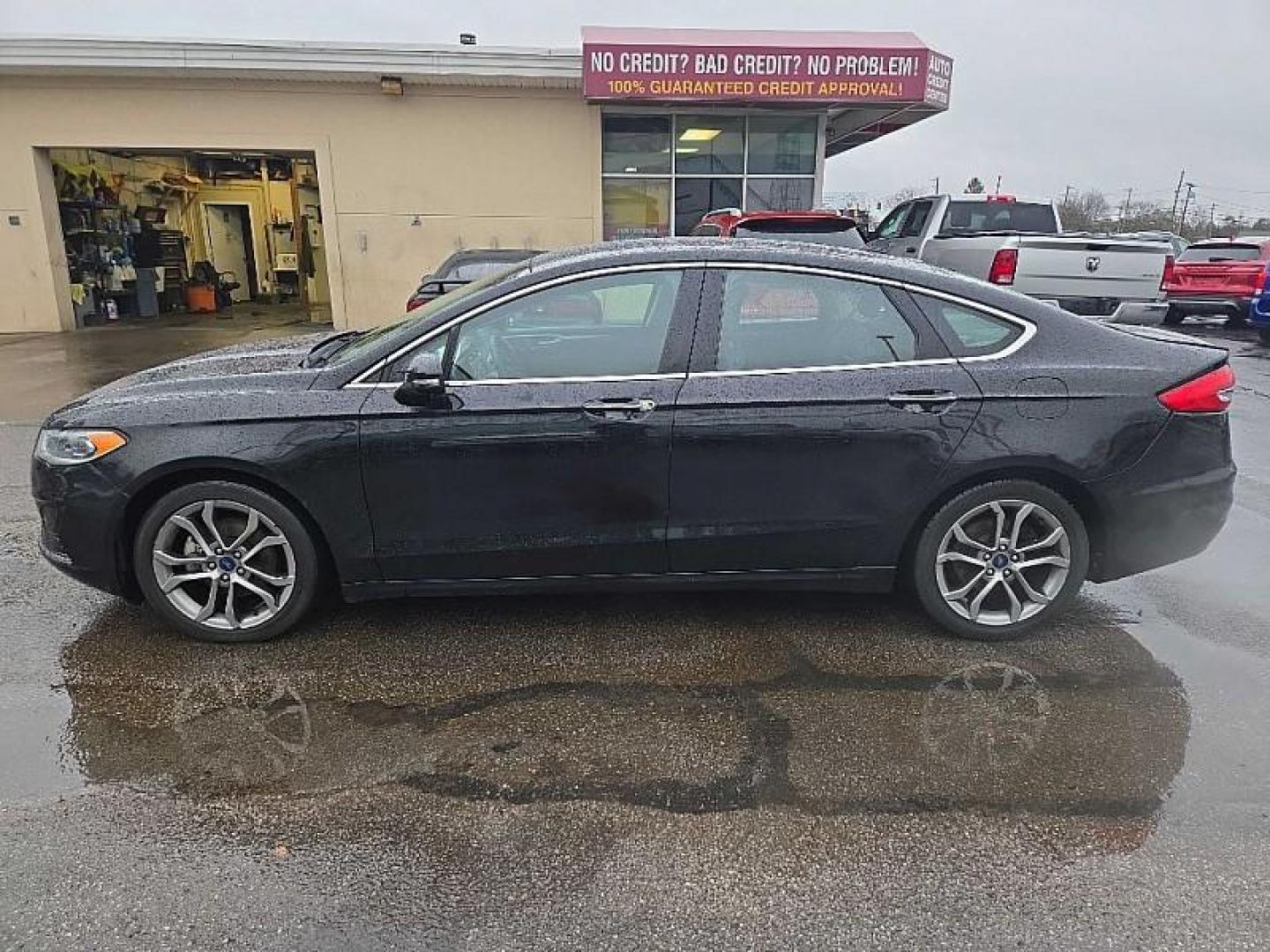 2019 BLACK /BLACK Ford Fusion SEL (3FA6P0CD3KR) with an 1.5L L4 DOHC 16V engine, 6A transmission, located at 3304 Woodville Road, Northwood, OH, 43619, (419) 210-8019, 41.612694, -83.480743 - Your #1 Destination for Auto Loans and mdash;No Matter Your Credit!At our dealership, we believe everyone deserves the opportunity to drive their dream car and mdash;whether you have good credit, bad credit, or no credit at all. With a wide selection of hundreds of cars, trucks, and SUVs, you'll fin - Photo#1