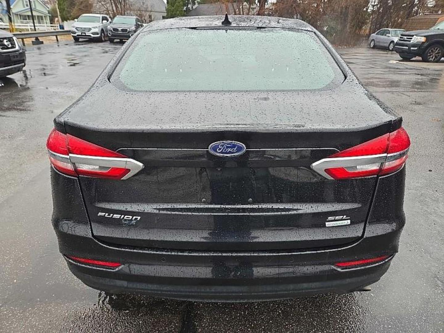 2019 BLACK /BLACK Ford Fusion SEL (3FA6P0CD3KR) with an 1.5L L4 DOHC 16V engine, 6A transmission, located at 3304 Woodville Road, Northwood, OH, 43619, (419) 210-8019, 41.612694, -83.480743 - Your #1 Destination for Auto Loans and mdash;No Matter Your Credit!At our dealership, we believe everyone deserves the opportunity to drive their dream car and mdash;whether you have good credit, bad credit, or no credit at all. With a wide selection of hundreds of cars, trucks, and SUVs, you'll fin - Photo#2