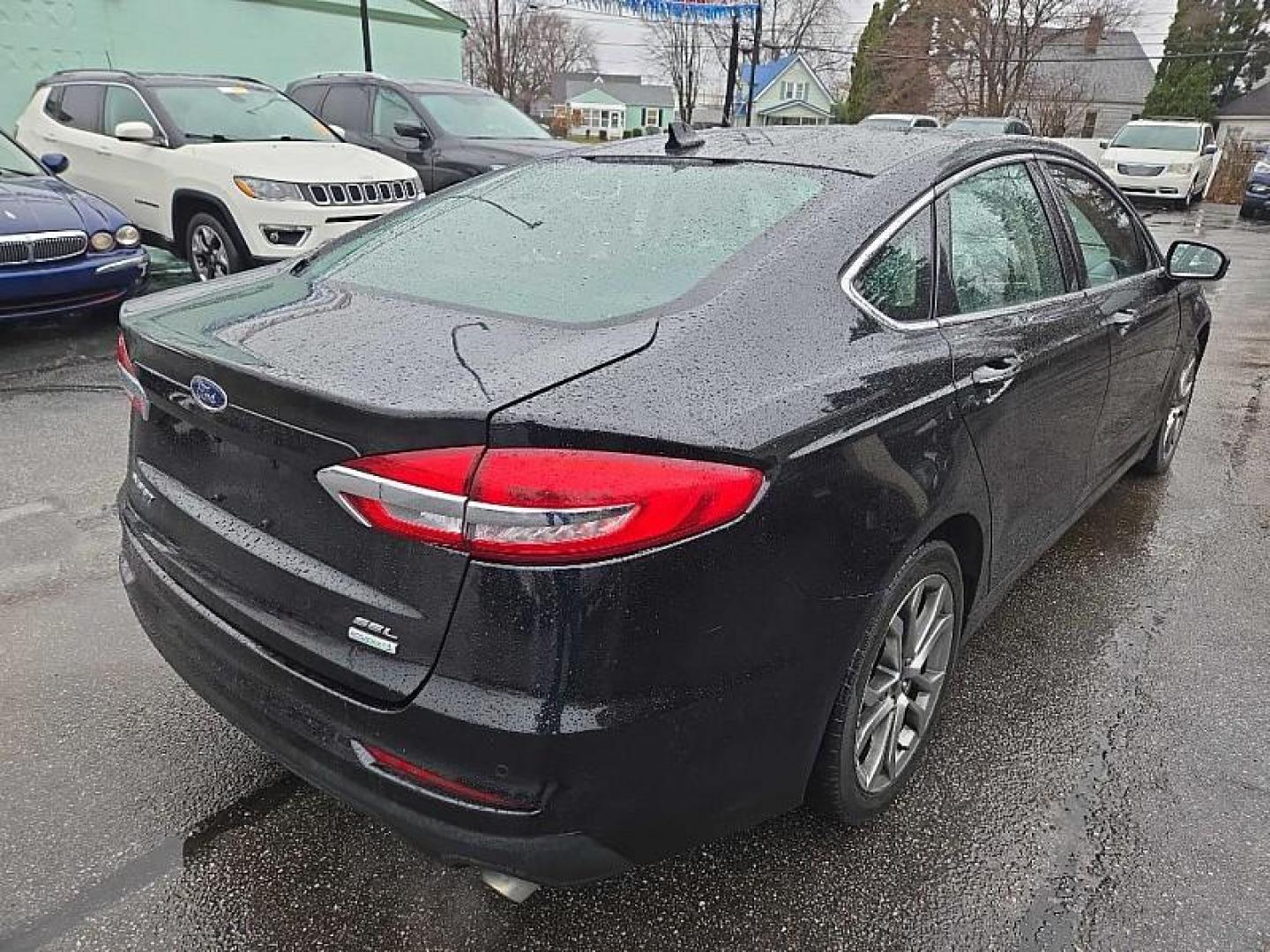 2019 BLACK /BLACK Ford Fusion SEL (3FA6P0CD3KR) with an 1.5L L4 DOHC 16V engine, 6A transmission, located at 3304 Woodville Road, Northwood, OH, 43619, (419) 210-8019, 41.612694, -83.480743 - Your #1 Destination for Auto Loans and mdash;No Matter Your Credit!At our dealership, we believe everyone deserves the opportunity to drive their dream car and mdash;whether you have good credit, bad credit, or no credit at all. With a wide selection of hundreds of cars, trucks, and SUVs, you'll fin - Photo#7