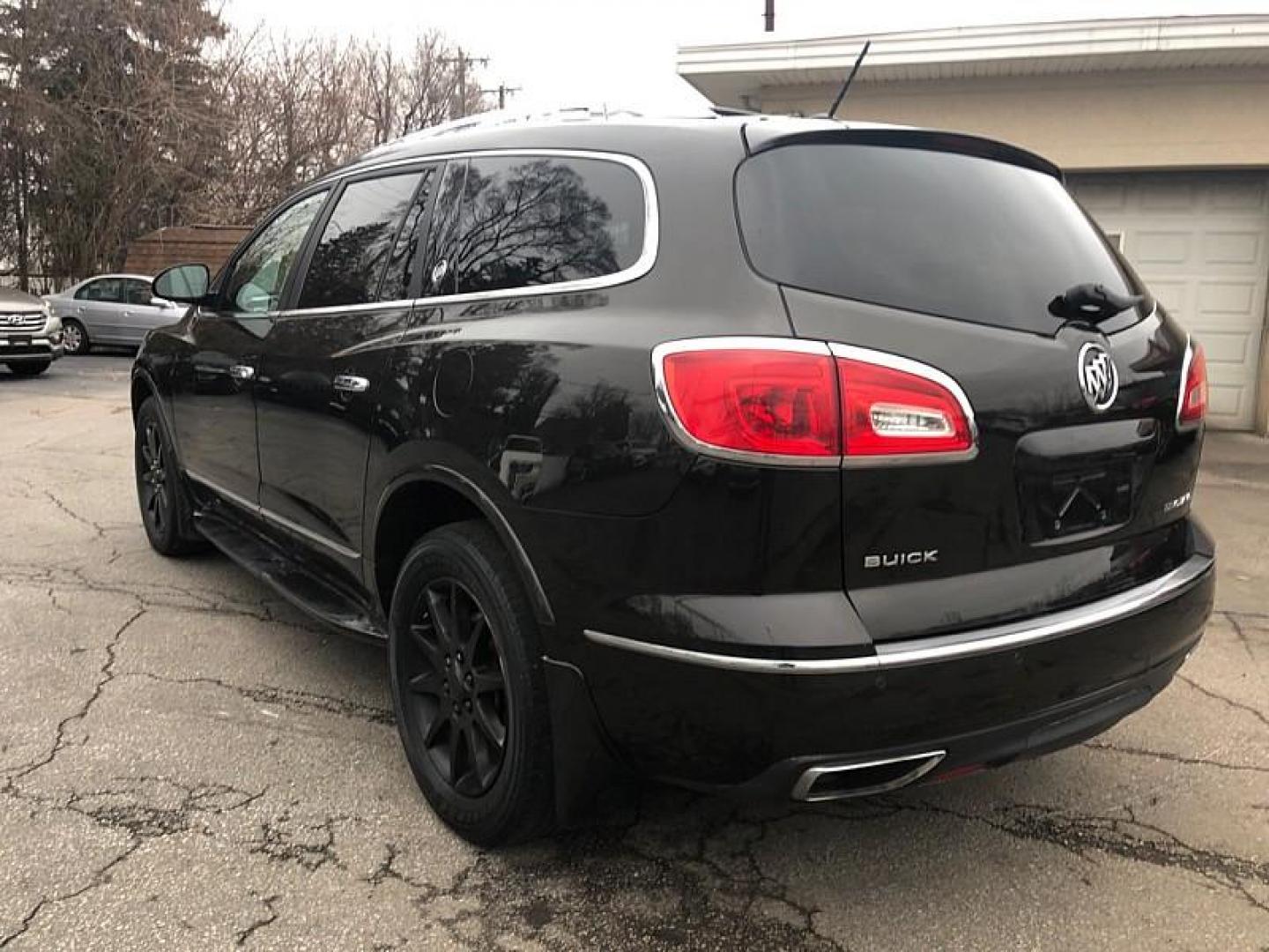 2014 GRAY /BROWN Buick Enclave Leather FWD (5GAKRBKD7EJ) with an 3.6L V6 DOHC 24V engine, 6-Speed Automatic Overdrive transmission, located at 3304 Woodville Road, Northwood, OH, 43619, (419) 210-8019, 41.612694, -83.480743 - Your #1 Destination for Auto Loans and mdash;No Matter Your Credit!At our dealership, we believe everyone deserves the opportunity to drive their dream car and mdash;whether you have good credit, bad credit, or no credit at all. With a wide selection of hundreds of cars, trucks, and SUVs, you'll fin - Photo#2