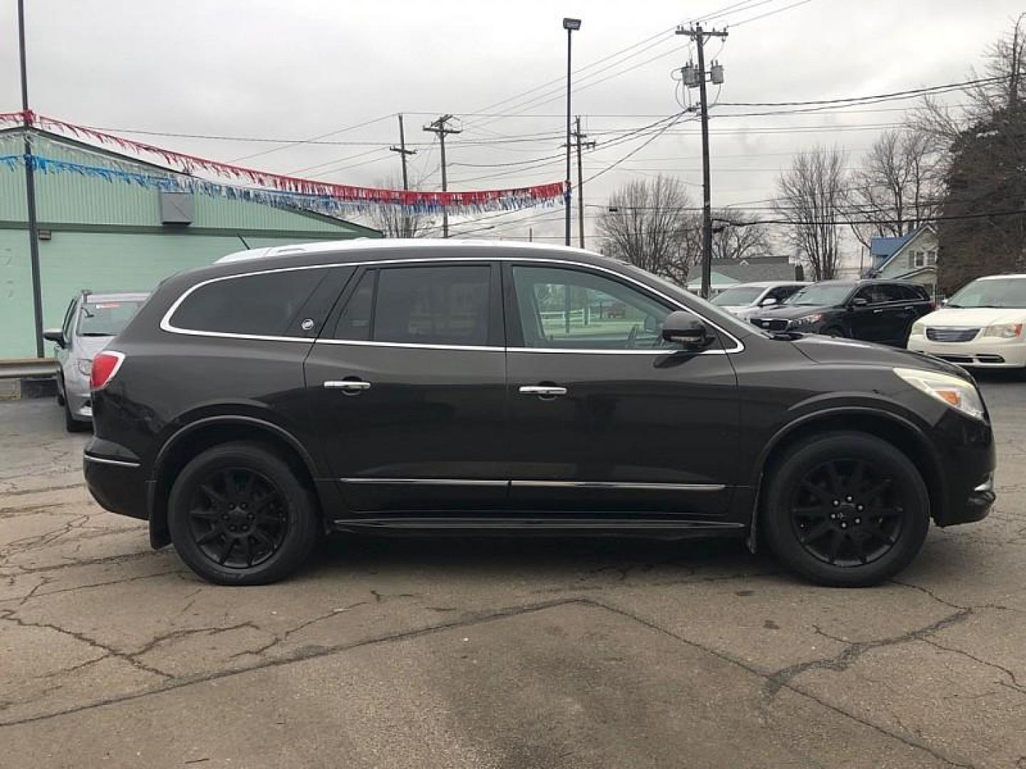 2014 GRAY /BROWN Buick Enclave Leather FWD (5GAKRBKD7EJ) with an 3.6L V6 DOHC 24V engine, 6-Speed Automatic Overdrive transmission, located at 3304 Woodville Road, Northwood, OH, 43619, (419) 210-8019, 41.612694, -83.480743 - Your #1 Destination for Auto Loans and mdash;No Matter Your Credit!At our dealership, we believe everyone deserves the opportunity to drive their dream car and mdash;whether you have good credit, bad credit, or no credit at all. With a wide selection of hundreds of cars, trucks, and SUVs, you'll fin - Photo#5