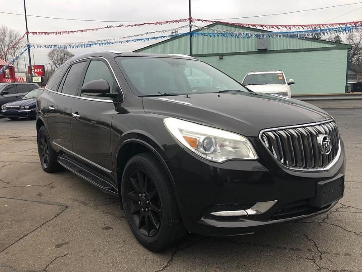 2014 GRAY /BROWN Buick Enclave Leather FWD (5GAKRBKD7EJ) with an 3.6L V6 DOHC 24V engine, 6-Speed Automatic Overdrive transmission, located at 3304 Woodville Road, Northwood, OH, 43619, (419) 210-8019, 41.612694, -83.480743 - Your #1 Destination for Auto Loans and mdash;No Matter Your Credit!At our dealership, we believe everyone deserves the opportunity to drive their dream car and mdash;whether you have good credit, bad credit, or no credit at all. With a wide selection of hundreds of cars, trucks, and SUVs, you'll fin - Photo#6