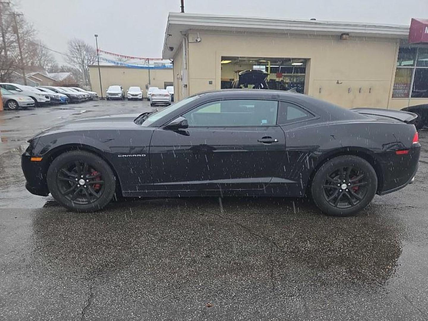 2015 BLACK /BLACK Chevrolet Camaro 2LS Coupe (2G1FB1E31F9) with an 3.6L V6 DOHC 24V FFV engine, 6-Speed Automatic transmission, located at 3304 Woodville Road, Northwood, OH, 43619, (419) 210-8019, 41.612694, -83.480743 - Your #1 Destination for Auto Loans and mdash;No Matter Your Credit!At our dealership, we believe everyone deserves the opportunity to drive their dream car and mdash;whether you have good credit, bad credit, or no credit at all. With a wide selection of hundreds of cars, trucks, and SUVs, you'll fin - Photo#2