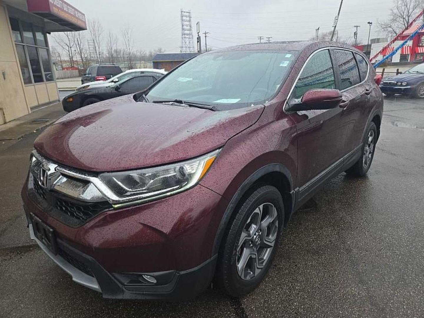 2017 RED /TAN Honda CR-V EX-L AWD (5J6RW2H81HL) with an 2.4L L4 DOHC 16V engine, CVT transmission, located at 3304 Woodville Road, Northwood, OH, 43619, (419) 210-8019, 41.612694, -83.480743 - Your #1 Destination for Auto Loans and mdash;No Matter Your Credit!At our dealership, we believe everyone deserves the opportunity to drive their dream car and mdash;whether you have good credit, bad credit, or no credit at all. With a wide selection of hundreds of cars, trucks, and SUVs, you'll fin - Photo#0