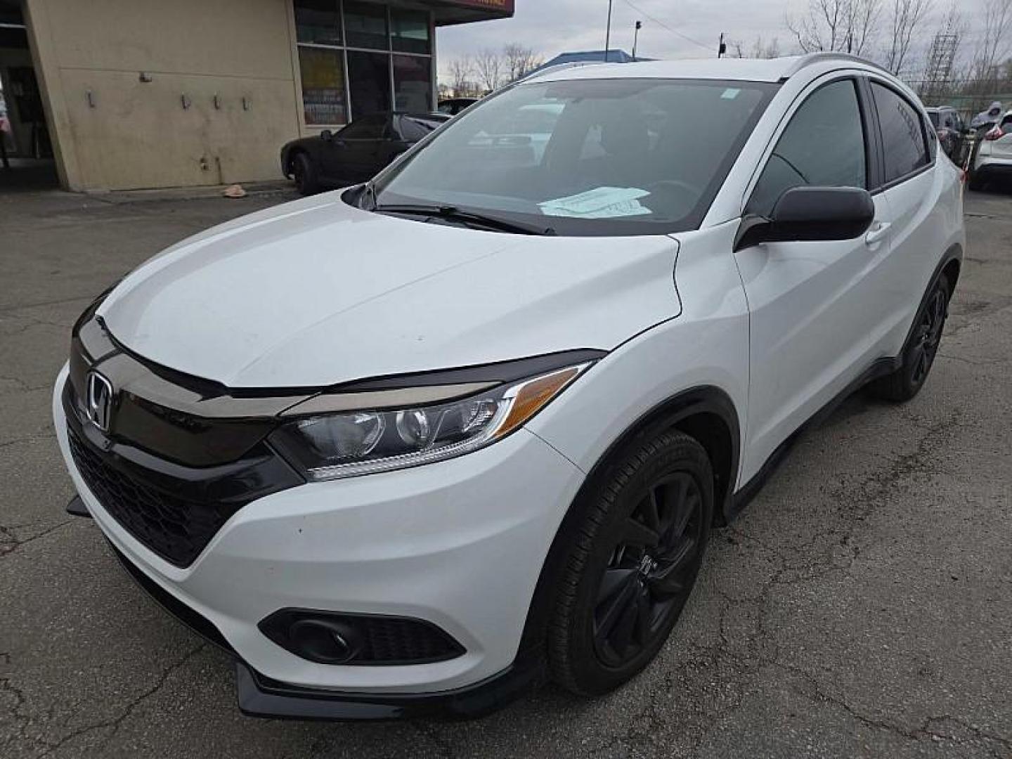 2021 WHITE /BLACK Honda HR-V Sport AWD (3CZRU6H19MM) with an 1.8L L4 DOHC 16V engine, CVT transmission, located at 3304 Woodville Road, Northwood, OH, 43619, (419) 210-8019, 41.612694, -83.480743 - Your #1 Destination for Auto Loans and mdash;No Matter Your Credit!At our dealership, we believe everyone deserves the opportunity to drive their dream car and mdash;whether you have good credit, bad credit, or no credit at all. With a wide selection of hundreds of cars, trucks, and SUVs, you'll fin - Photo#0