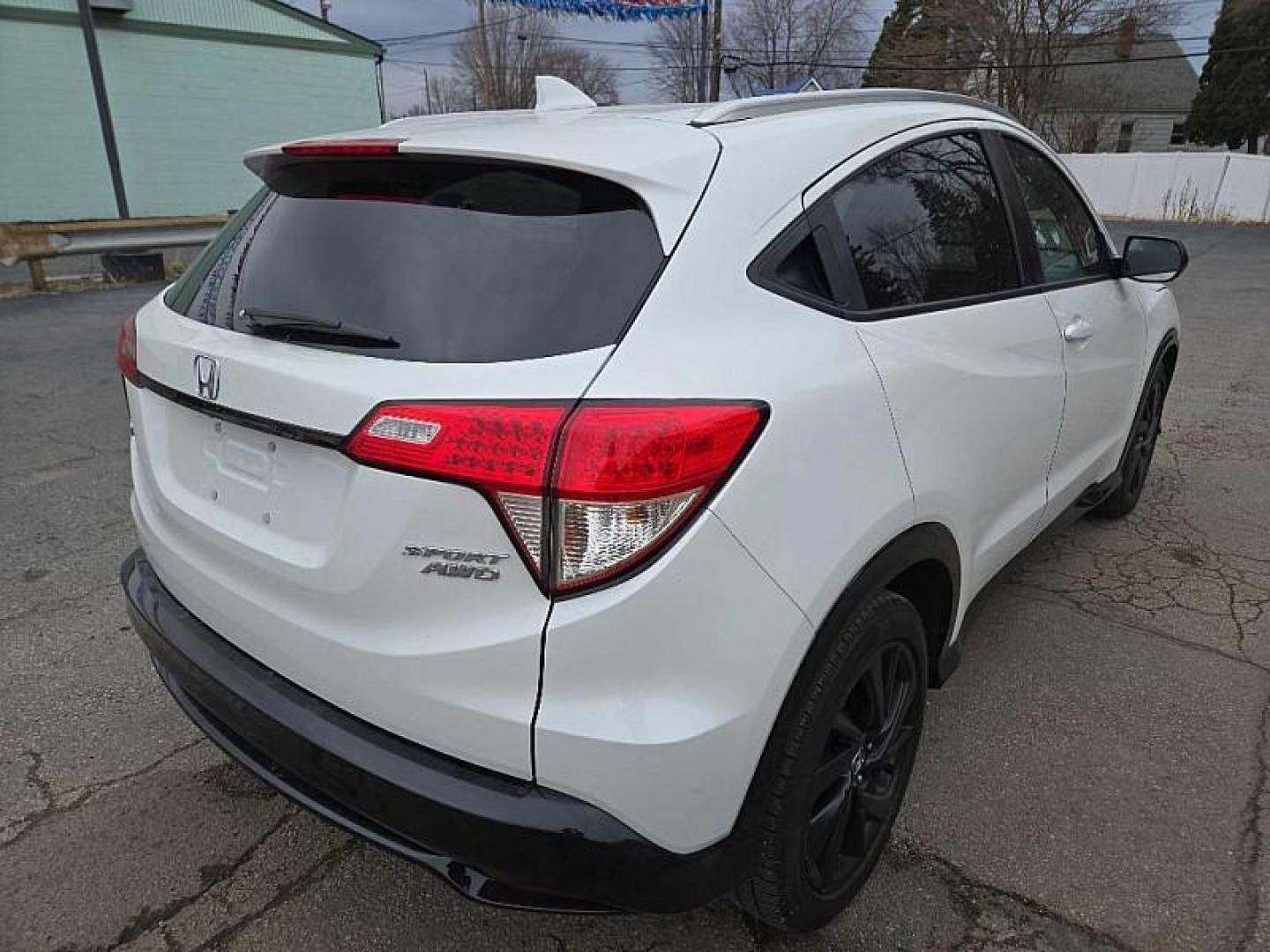 2021 WHITE /BLACK Honda HR-V Sport AWD (3CZRU6H19MM) with an 1.8L L4 DOHC 16V engine, CVT transmission, located at 3304 Woodville Road, Northwood, OH, 43619, (419) 210-8019, 41.612694, -83.480743 - Your #1 Destination for Auto Loans and mdash;No Matter Your Credit!At our dealership, we believe everyone deserves the opportunity to drive their dream car and mdash;whether you have good credit, bad credit, or no credit at all. With a wide selection of hundreds of cars, trucks, and SUVs, you'll fin - Photo#4