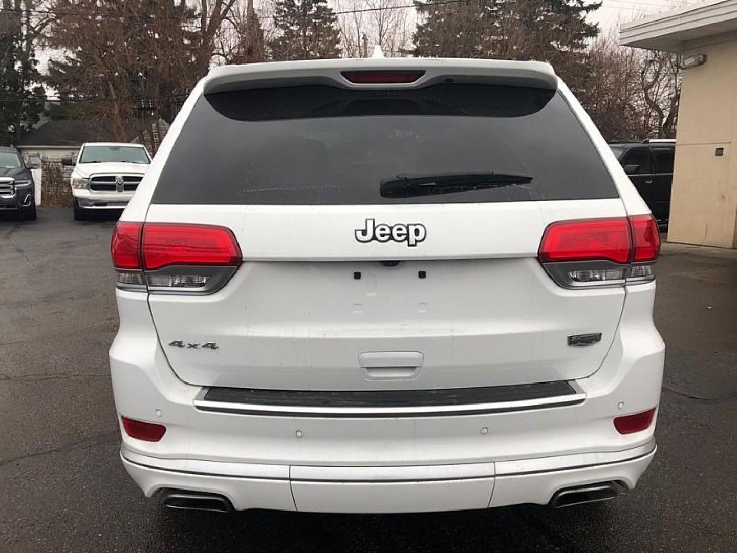 2016 WHITE /BROWN Jeep Grand Cherokee Summit 4WD (1C4RJFJG0GC) with an 3.6L V6 DOHC 24V engine, 8A transmission, located at 3304 Woodville Road, Northwood, OH, 43619, (419) 210-8019, 41.612694, -83.480743 - Your #1 Destination for Auto Loans and mdash;No Matter Your Credit!At our dealership, we believe everyone deserves the opportunity to drive their dream car and mdash;whether you have good credit, bad credit, or no credit at all. With a wide selection of hundreds of cars, trucks, and SUVs, you'll fin - Photo#3