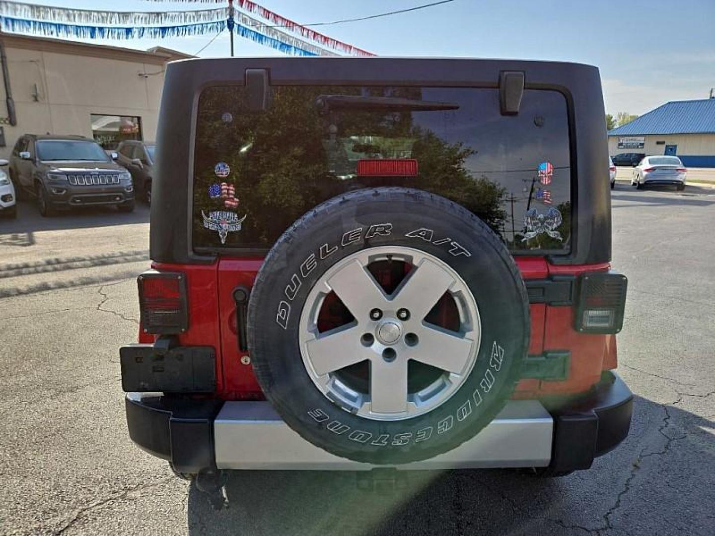 2011 RED /BLACK Jeep Wrangler Unlimited Sahara 4WD (1J4BA5H11BL) with an 3.8L V6 OHV 12V engine, Automatic 4-Spd w/Overdrive transmission, located at 3304 Woodville Road, Northwood, OH, 43619, (419) 210-8019, 41.612694, -83.480743 - We are #1 Auto Loan Dealer for Good Bad or No Credit we have hundreds of vehicles to choose from, stop on in or just fill out our online application to get approved for auto financing and see your credit score for free by visiting our website today. We have Low Payment Options and Terms Available - Photo#1