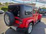 2011 RED /BLACK Jeep Wrangler Unlimited Sahara 4WD (1J4BA5H11BL) with an 3.8L V6 OHV 12V engine, Automatic 4-Spd w/Overdrive transmission, located at 3304 Woodville Road, Northwood, OH, 43619, (419) 210-8019, 41.612694, -83.480743 - We are #1 Auto Loan Dealer for Good Bad or No Credit we have hundreds of vehicles to choose from, stop on in or just fill out our online application to get approved for auto financing and see your credit score for free by visiting our website today. We have Low Payment Options and Terms Available - Photo#2