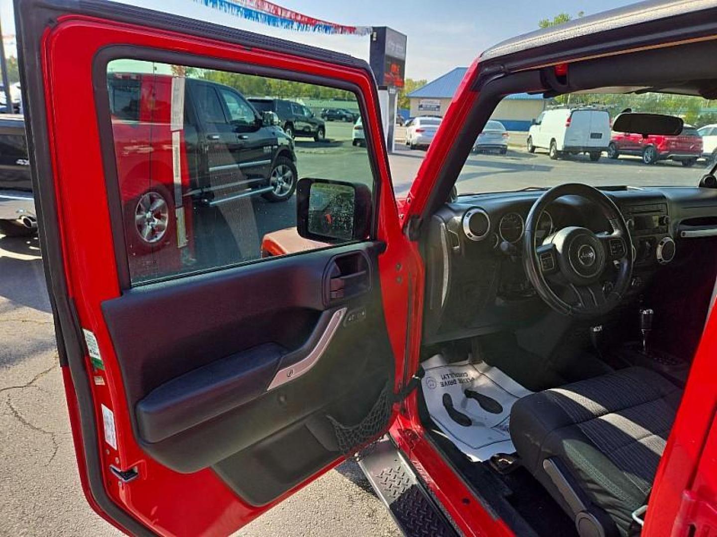 2011 RED /BLACK Jeep Wrangler Unlimited Sahara 4WD (1J4BA5H11BL) with an 3.8L V6 OHV 12V engine, Automatic 4-Spd w/Overdrive transmission, located at 3304 Woodville Road, Northwood, OH, 43619, (419) 210-8019, 41.612694, -83.480743 - We are #1 Auto Loan Dealer for Good Bad or No Credit we have hundreds of vehicles to choose from, stop on in or just fill out our online application to get approved for auto financing and see your credit score for free by visiting our website today. We have Low Payment Options and Terms Available - Photo#8